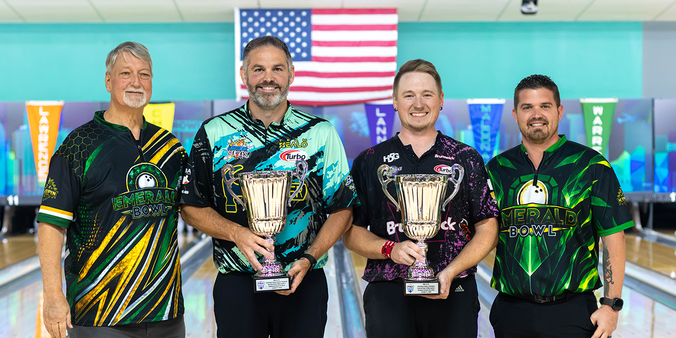 Champions at Southwest Regional: Tom Daugherty and AJ Chapman posing with trophies