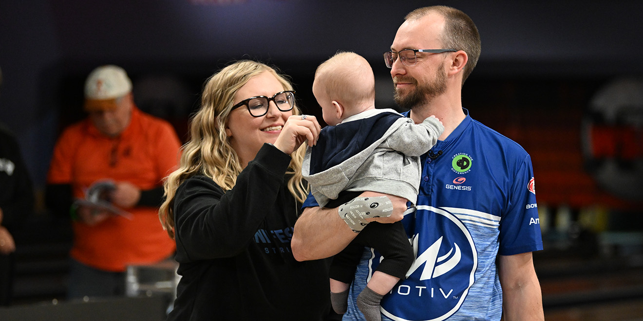 EJ Tackett with his family after winning