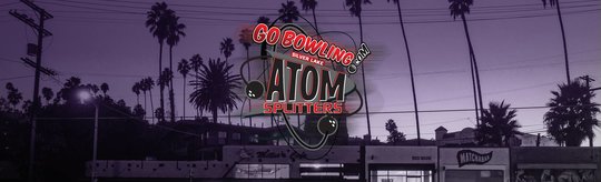 The Atom Splitters logo centered in front of the Silver Lake skyline with palm trees