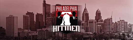 The Hitmen logo is centered in front of the Philadelphia city skyline