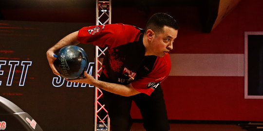 man throwing a bowling ball