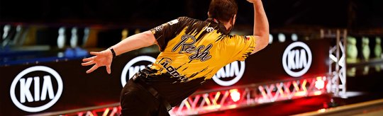 action shot with the kia logo in the background